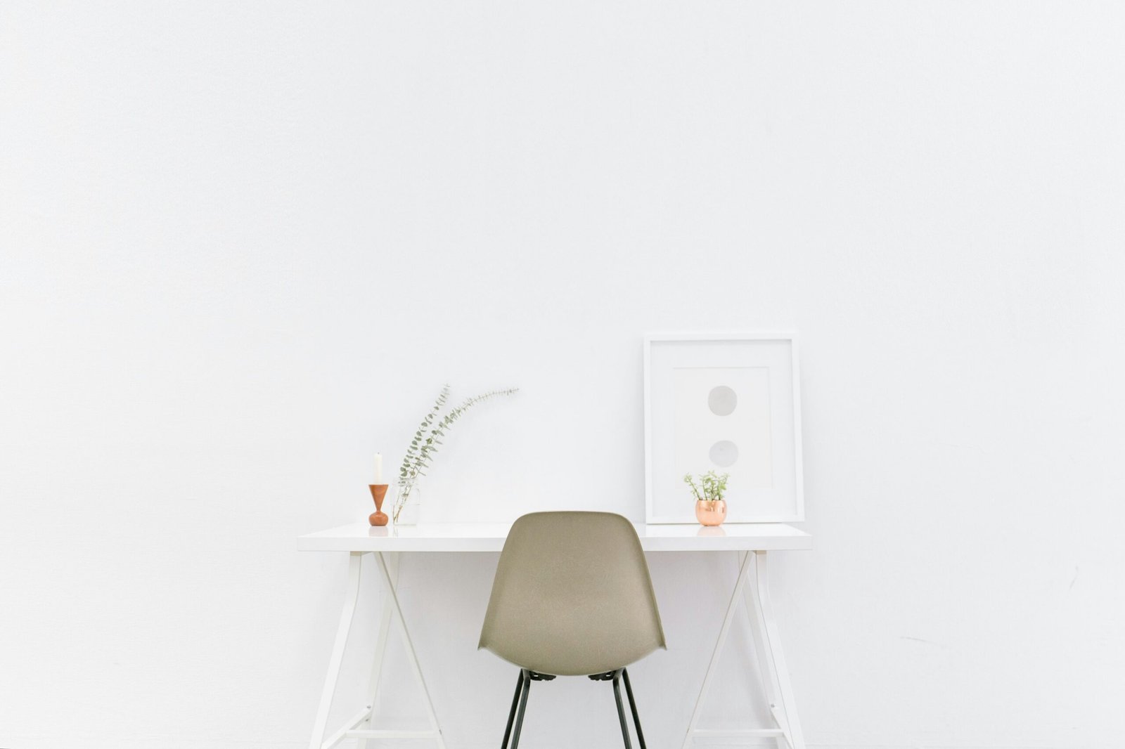 white wooden table near brown chair